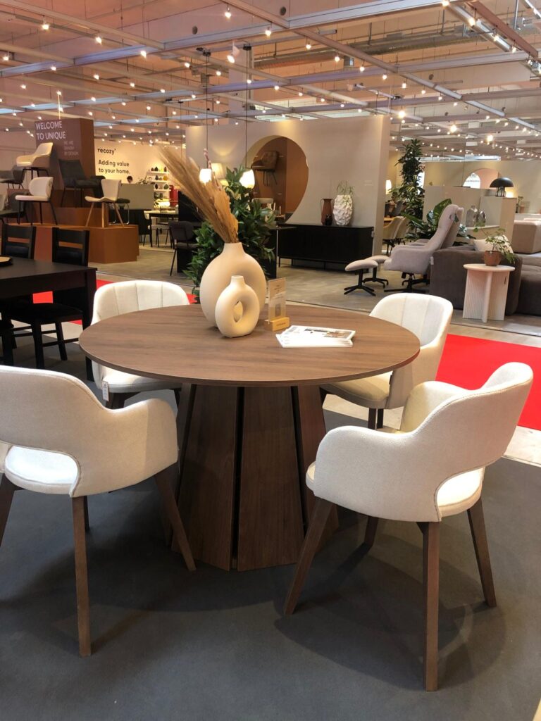 the sterling extendable round dining table with geometric base 4 768x1024